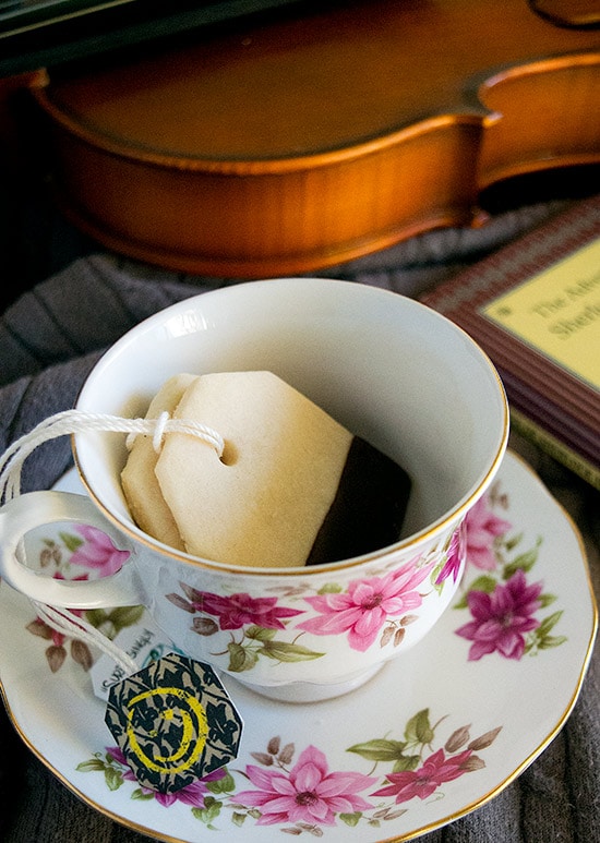 Charming shortbread tea bag cookies, dipped in chocolate, with printable "Sherlock" tea tags from BakingMischief.com.