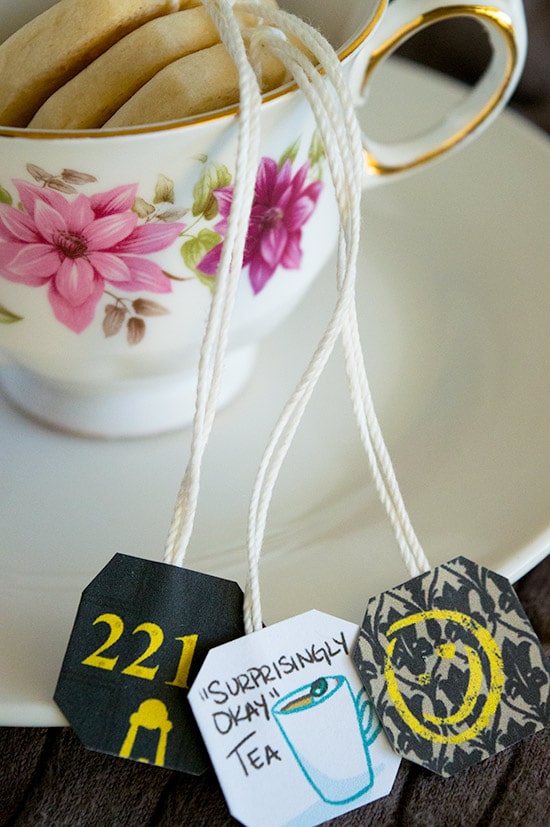 Charming shortbread tea bag cookies, dipped in chocolate, with printable "Sherlock" tea tags from BakingMischief.com.