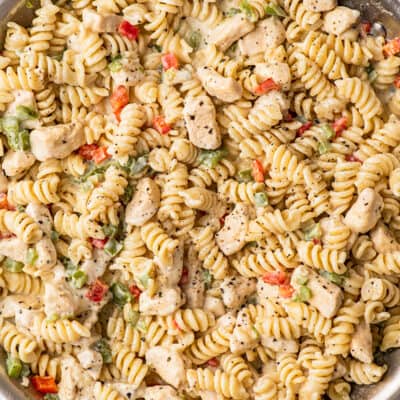 Creamy chicken pasta in a skillet.