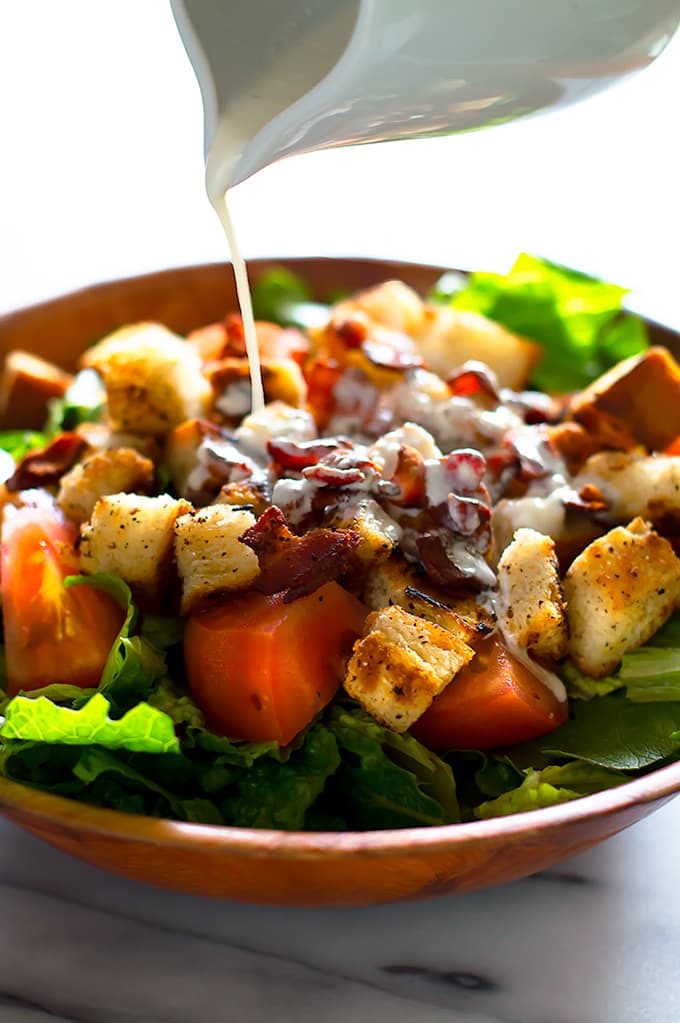 This Light and Healthy BLT Salad is a delicious twist on a favorite diner classic. From BakingMischief.com