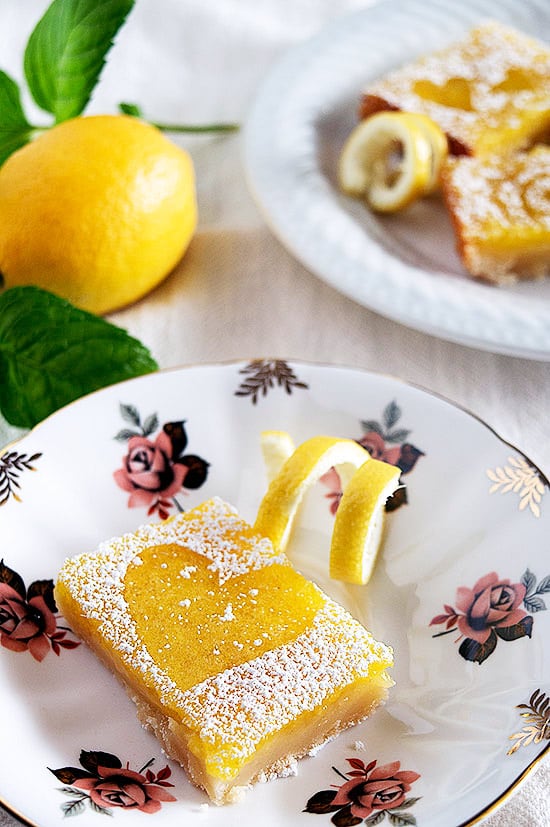 The EASIEST, best tasting lemon bars you've ever tried. Tart, sweet, and oh so pretty! Recipe includes nutritional information and freezing instructions.
