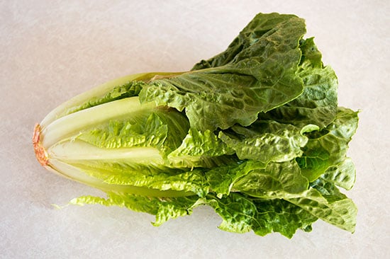 How to cut romaine lettuce for salads the fastest and easiest way possible. From BakingMischief.com
