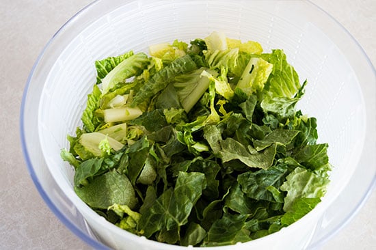 How to cut romaine lettuce for salads the fastest and easiest way possible. From BakingMischief.com