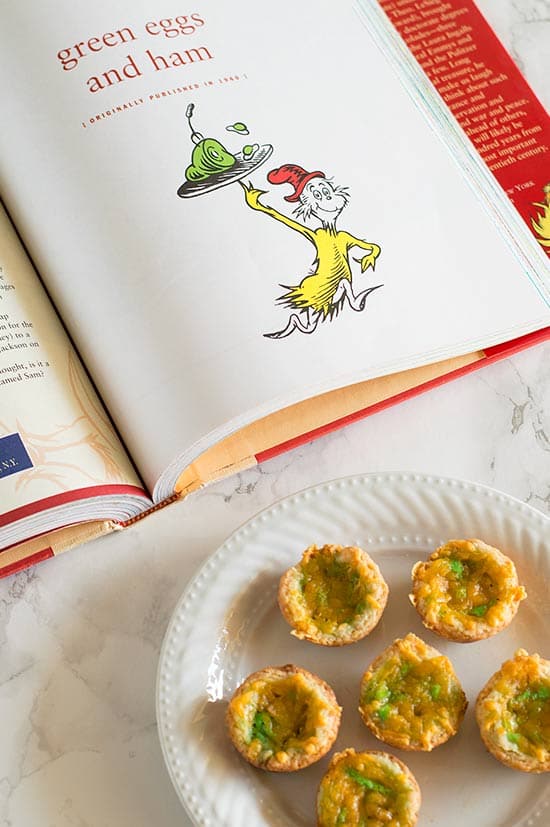 Green Eggs and Ham Mini Quiche - Green eggs, ham, and cheddar cheese in a buttermilk crust make a fun and delicious tribute to one of Dr. Seuss' most beloved works. So tasty you might not want to share them with the kids! Recipe includes nutritional information and freezer instructions. From BakingMischief.com
