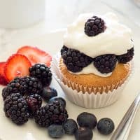 Pound Cake Cupcakes are a perfect excuse to eat cupcakes for breakfast. Light, buttery pound cake topped with the berries of your choice and smothered in a lot more than a dollop of homemade whipped cream.