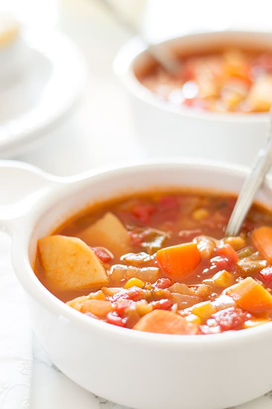 Mexican vegan vegetable stew in white bowls.