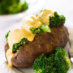 Slow Cooker Baked Potatoes With Broccoli and Cheese Sauce