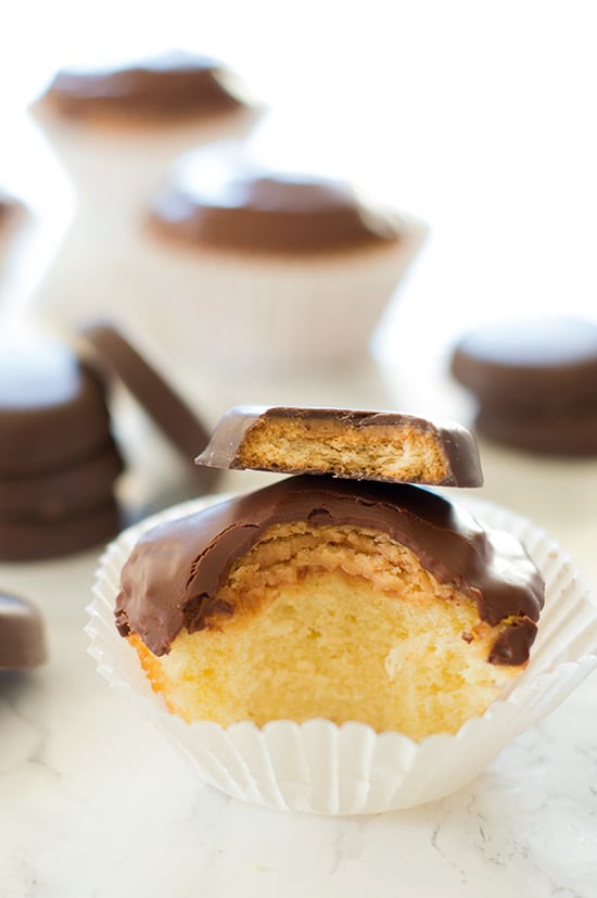 Tagalong Cupcakes are pound cake covered in peanut butter buttercream and dipped in chocolate. A perfect cupcake version of the Girl Scouts' best cookie. From BakingMischief.com