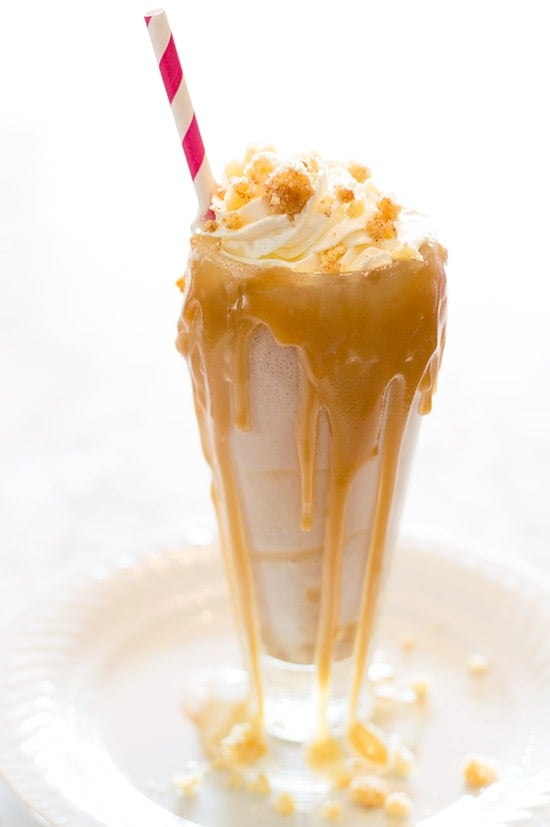 A ridiculously delicious snickerdoodle milkshake topped with salted caramel and whipped cream. Recipe includes nutritional information. From BakingMischief.com