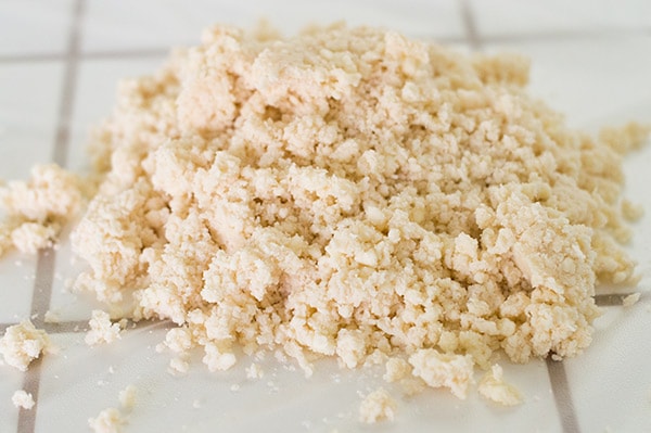 Pile of buttermilk pie crust crumbs before being shaped.