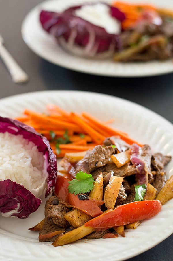 Two plates of Lomo Saltado.