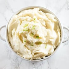How to make easy homemade mashed potatoes with no recipe required, instructions I wish someone had given me during my childhood of eating boxed mashed potatoes! From BakingMischief.com