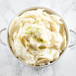 How to make easy homemade mashed potatoes with no recipe required, instructions I wish someone had given me during my childhood of eating boxed mashed potatoes! From BakingMischief.com