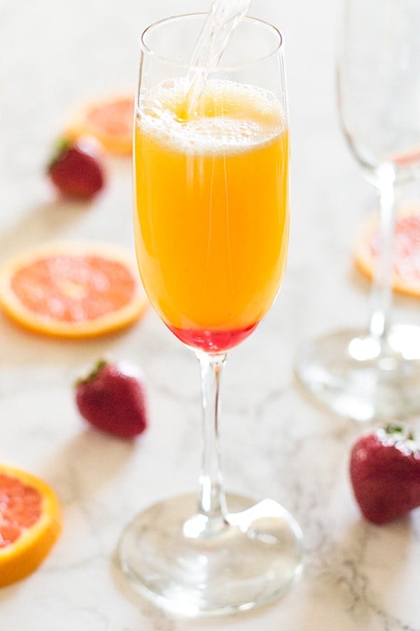 Make brunch even better with a simple but beautiful strawberry upgrade to your classic mimosa recipe. Recipe includes nutritional information and "mocktail" instructions. From BakingMischief.com