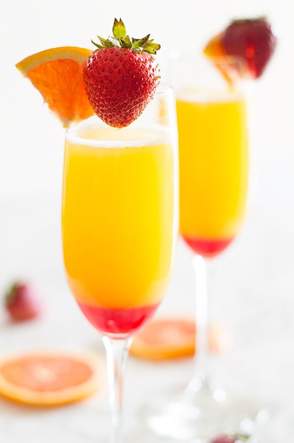Make brunch even better with a simple but beautiful strawberry upgrade to your classic mimosa recipe. Recipe includes nutritional information and "mocktail" instructions. From BakingMischief.com