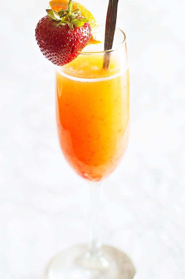 Make brunch even better with a simple but beautiful strawberry upgrade to your classic mimosa recipe. Recipe includes nutritional information and "mocktail" instructions. From BakingMischief.com