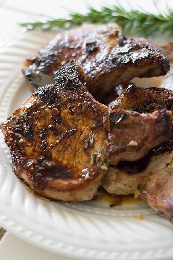 Quick pork chops made with rosemary and sherry that can be on the table in about 20 minutes. So easy and delicious you won't believe it. Recipe includes nutritional information. From BakingMischief.com