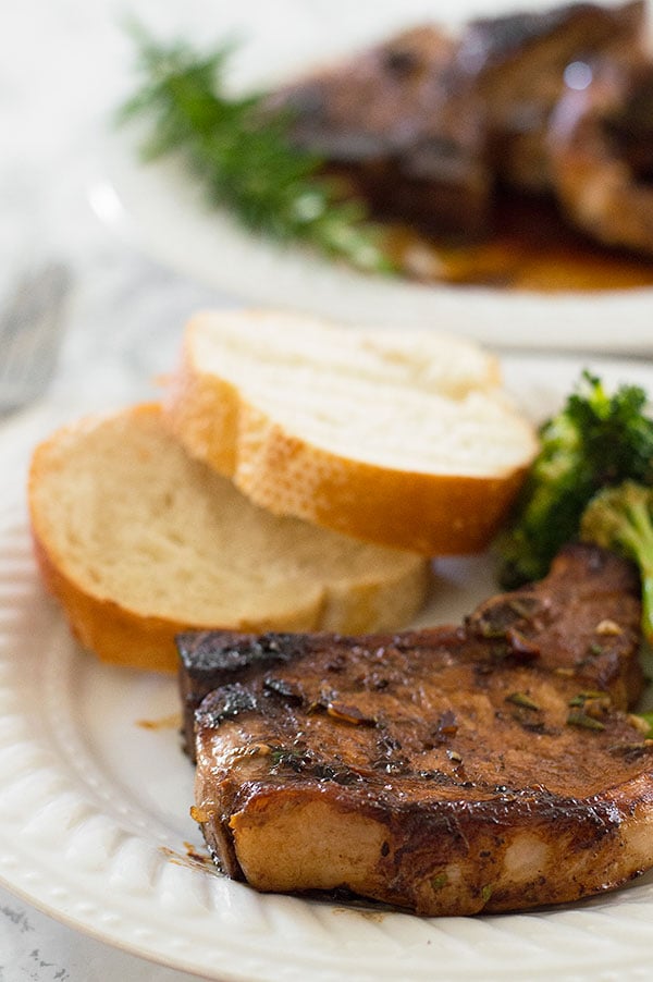 Quick pork chops made with rosemary and sherry that can be on the table in about 20 minutes. So easy and delicious you won't believe it. Recipe includes nutritional information. From BakingMischief.com