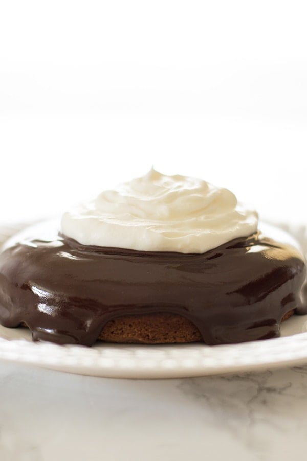 This small batch of light and tangy cream cheese whipped cream is quick and easy to make. Serve over fruit for a light dessert or pile high over baked goods for something truly decadent. Recipe includes nutritional information. From BakingMischief.com