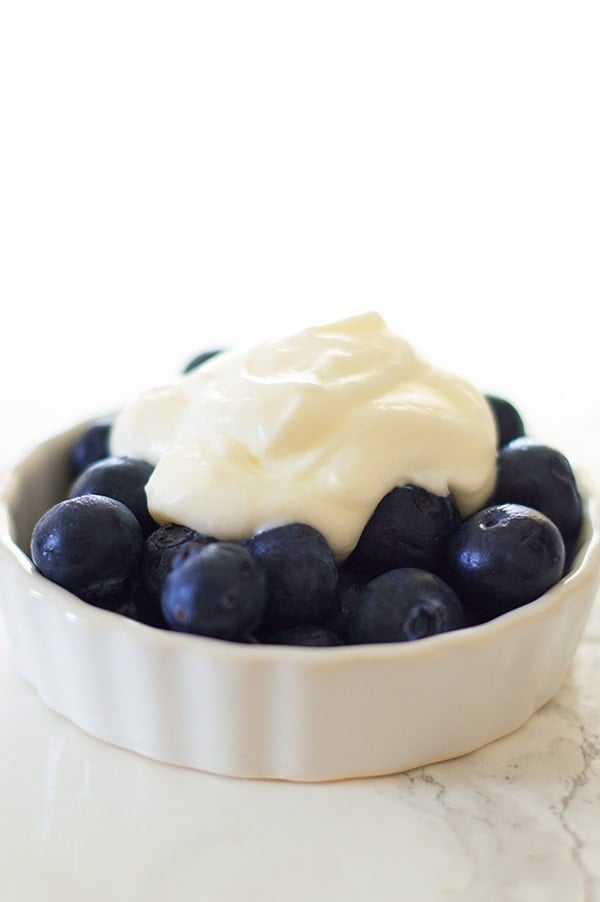 This small batch of light and tangy cream cheese whipped cream is quick and easy to make. Serve over fruit for a light dessert or pile high over baked goods for something truly decadent. Recipe includes nutritional information. From BakingMischief.com