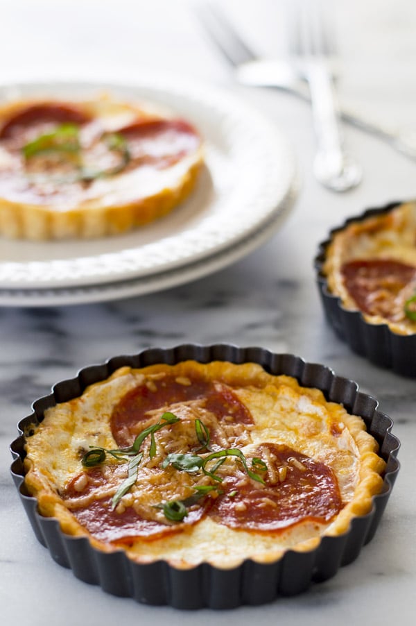 Pizza tart in a tart mold.