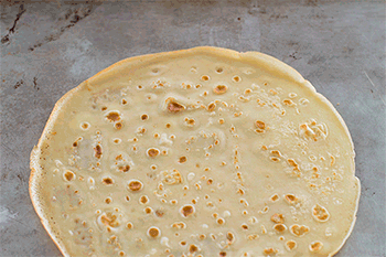 Gif of Strawberry and Nutella Crepe Cone being rolled.