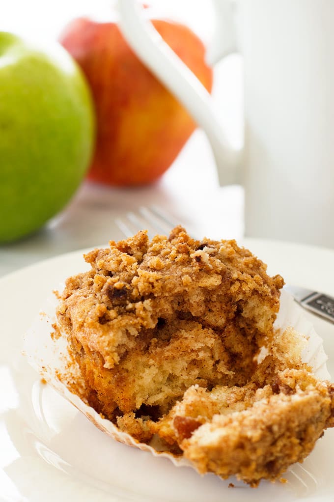Apple crumb muffin split in two.