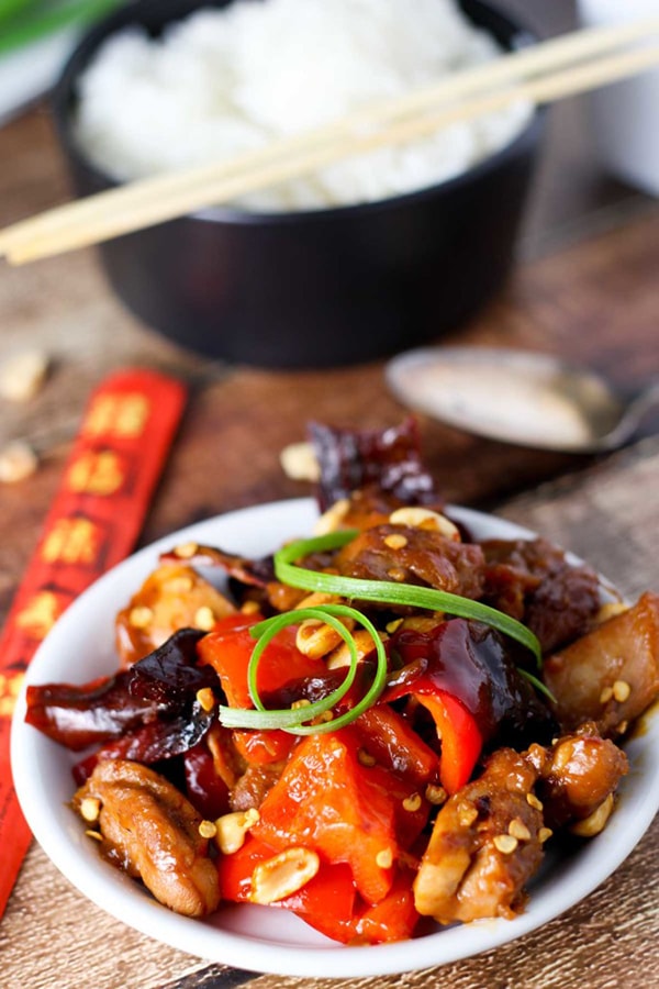 Kung Pao chicken in a white bowl.