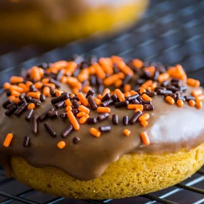 These moist Pumpkin Donuts with Maple Glaze make a perfect Fall breakfast or Fall dessert! | #PumpkinRecipes | #Breakfast | #FallRecipes |