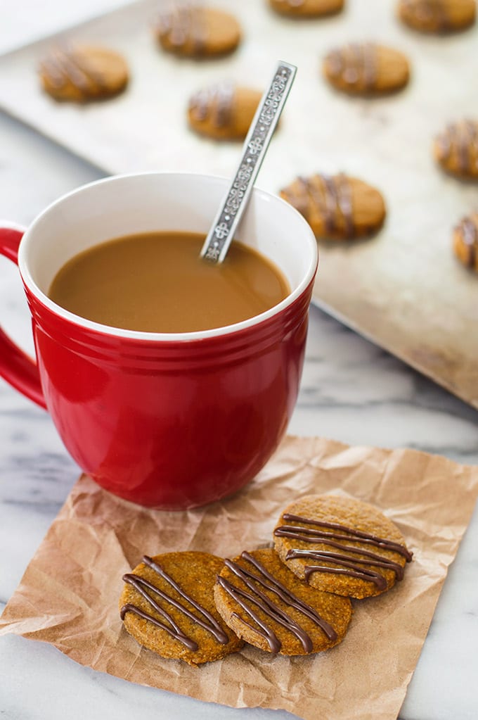 Pumpkin shortbread cookies with a cup of coffee.