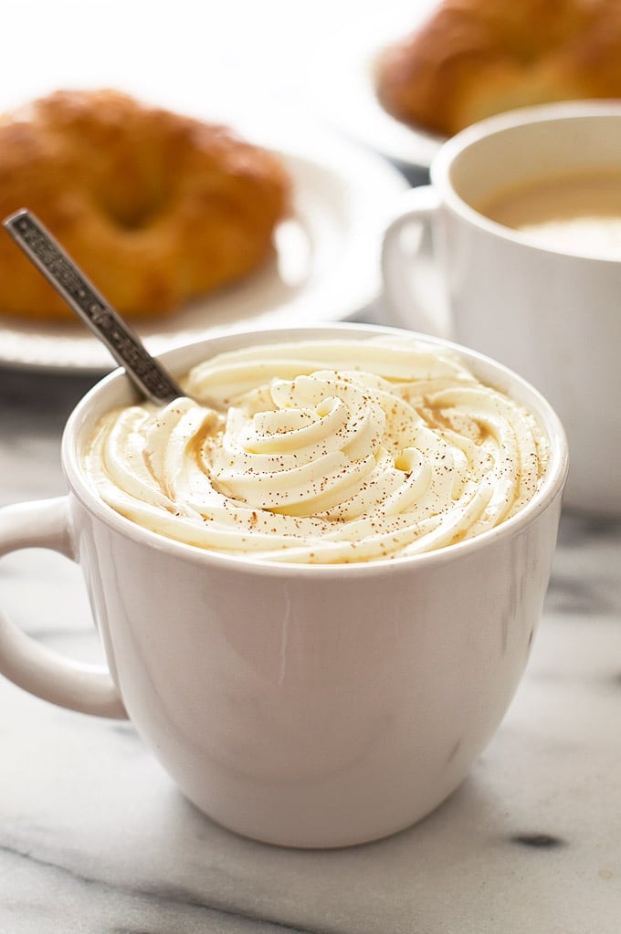 Pumpkin spice latte recipe with whipped cream.