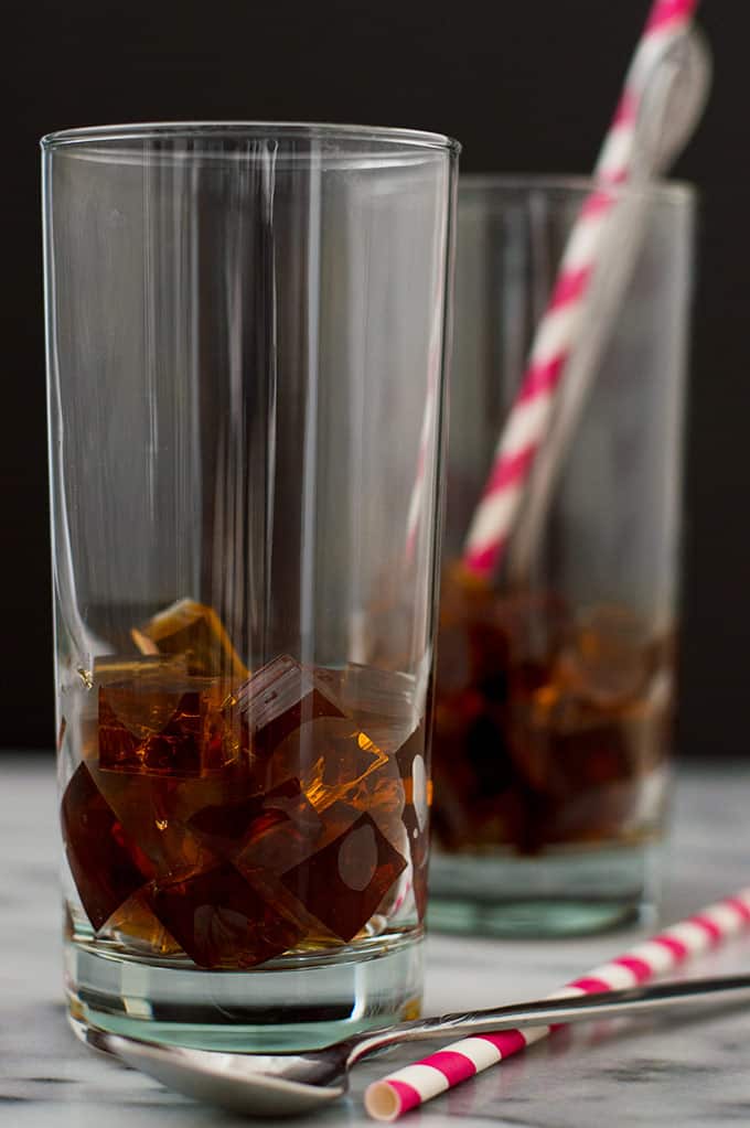 Glass with coffee jelly at the bottom.