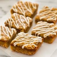 These small-batch Shortbread Pumpkin Pie Bars are everything you love about pumpkin pie, but with an easy shortbread base, crunchy streusel topping, and sweet cream drizzle! Recipe includes nutritional information. From BakingMischief.com
