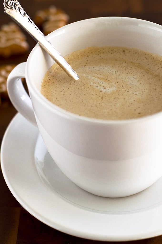 Eggnog latte in a white mug.