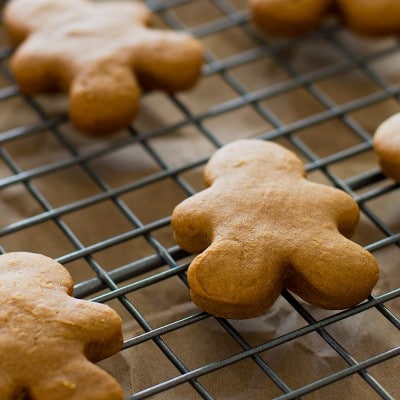 Gingerbread treats for dogs and horses on a baking rack.
