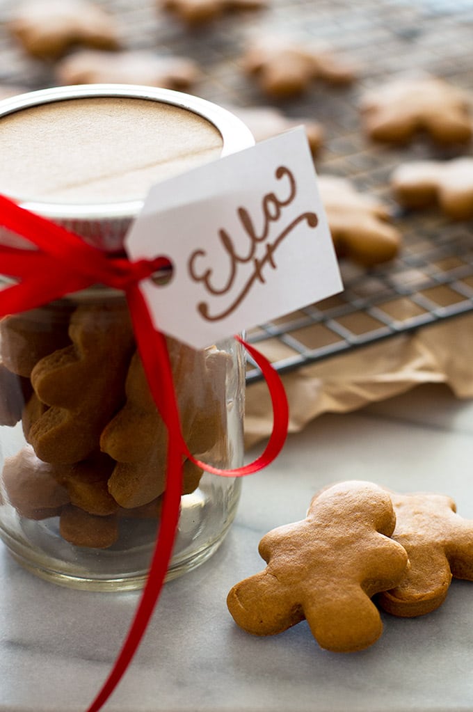 Horse and dog gingerbread treats in a glass jar for gifting.