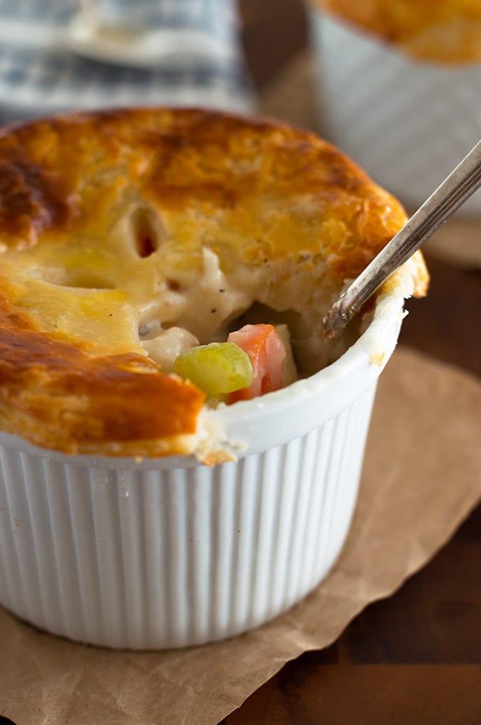 Individual Chicken Pot Pie with a bite out of it.