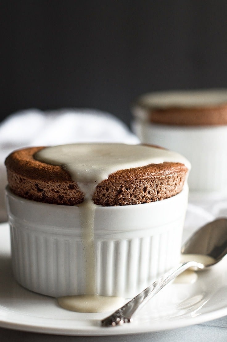 Chocolate Souffles for Two with Creme Anglaise are a perfect make ahead date night dessert. From BakingMischief.com