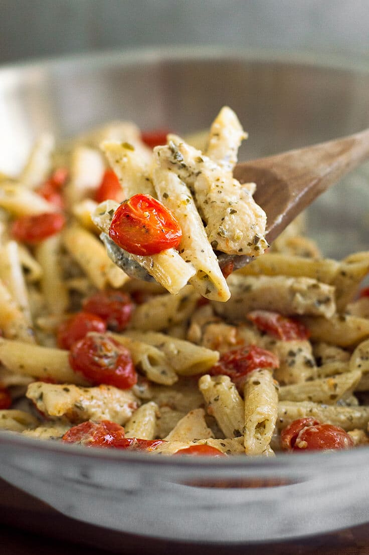 Wooden spoonful of Pesto Chicken Pasta.