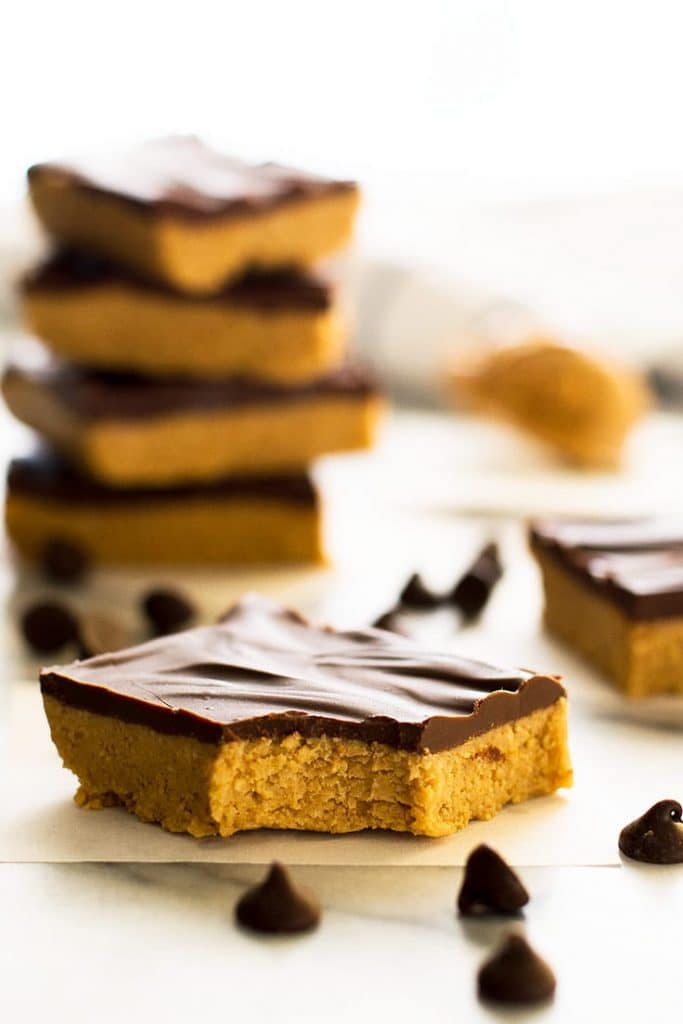Picture of a peanut butter bar with a bite out of it.