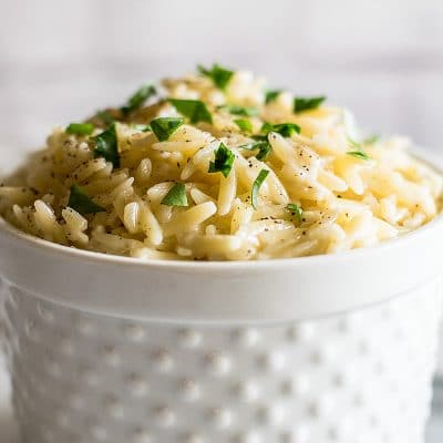 This easy Parmesan Orzo Side Dish is my favorite pasta side. It's quick and easy to make, so creamy, and absolutely delicious. | Sides for Two | Easy Sides | Pasta Side Dish |