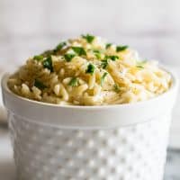 This easy Parmesan Orzo Side Dish is my favorite pasta side. It's quick and easy to make, so creamy, and absolutely delicious. | Sides for Two | Easy Sides | Pasta Side Dish |