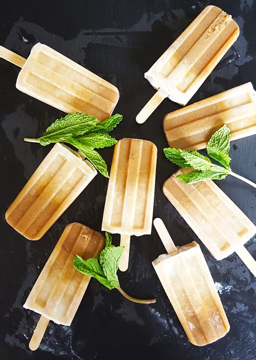 Boozy Mint Coffee Coconut Cream Popsicles from Feast in Thyme - My favorite popsicle tips and tricks plus some of the best popsicle recipes on the internet!