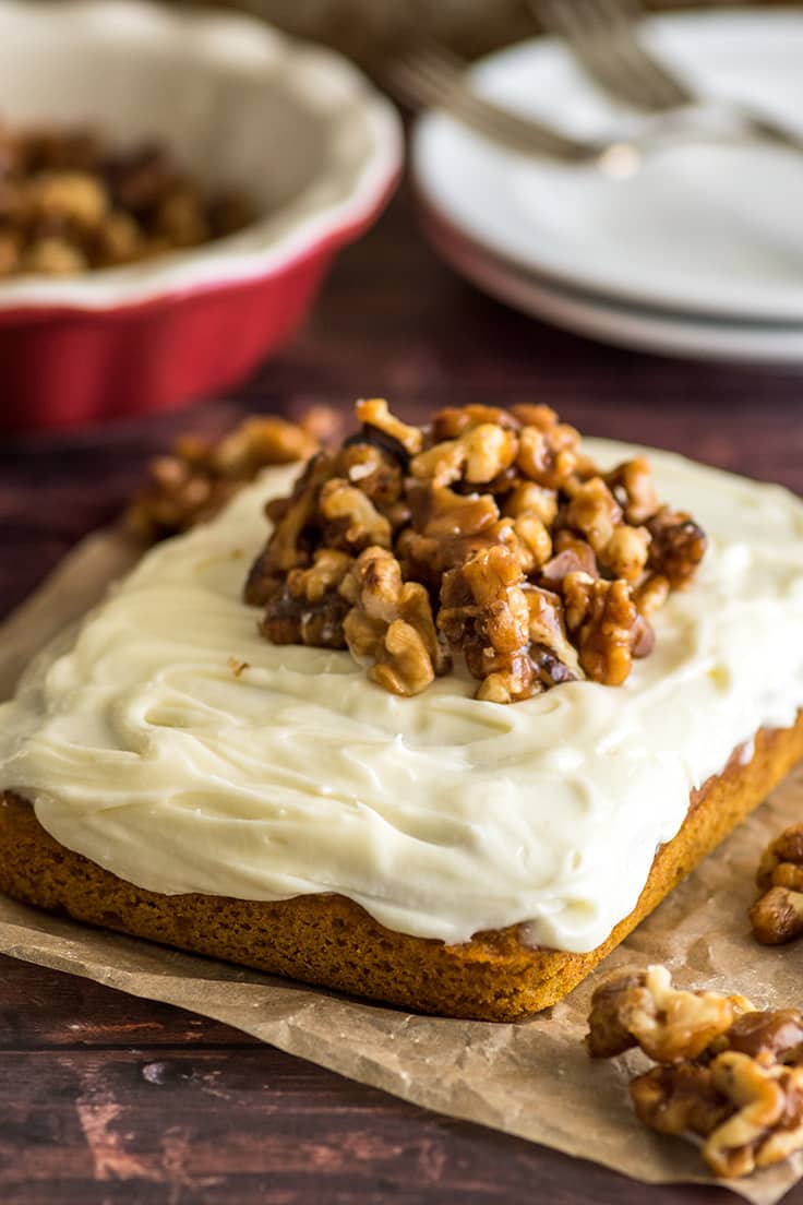 Mini Pumpkin Cake with cream cheese frosting and candied walnuts.