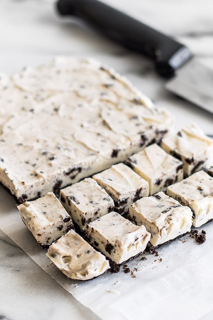 Small batch of oreo cheesecake bites being cut into pieces.