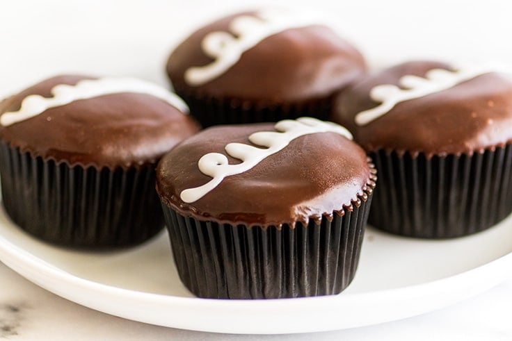 With this recipe for Small-batch Homemade Hostess Cupcakes, you can make a childhood favorite at home! Moist chocolate cake, creamy marshmallow filling, and luscious chocolate topping. What could be better? | Small-batch Cupcakes | Small-batch Desserts | Chocolate Desserts |