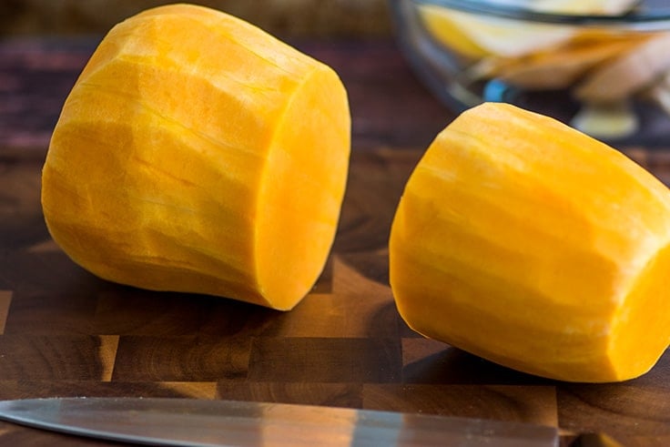 Butternut squash peeled and cut in half.