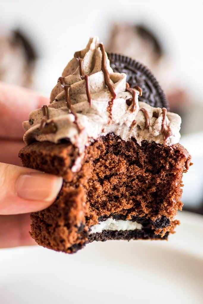 The Oreo at the bottom of these Small-batch Oreo Cupcakes gives them just a tiny bit of crunch and then almost melts in your mouth. | #cupcakes | #Oreos | Small-batch Desserts |