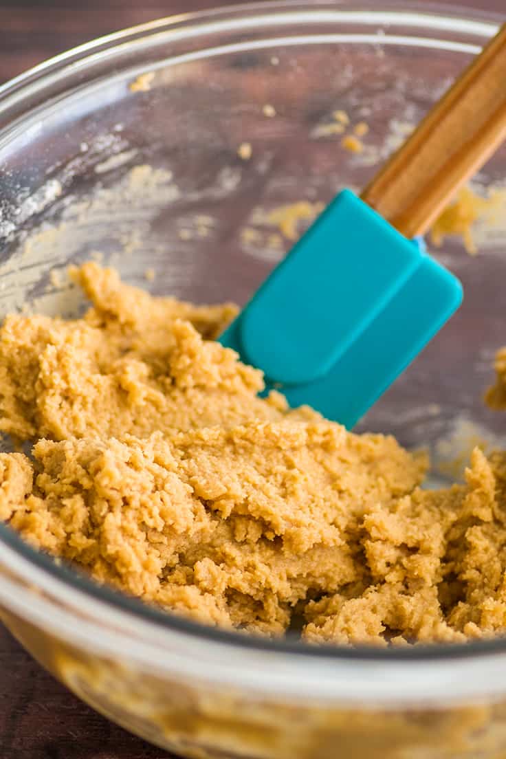 Small-batch peanut butter cookie dough in a glass bowl.