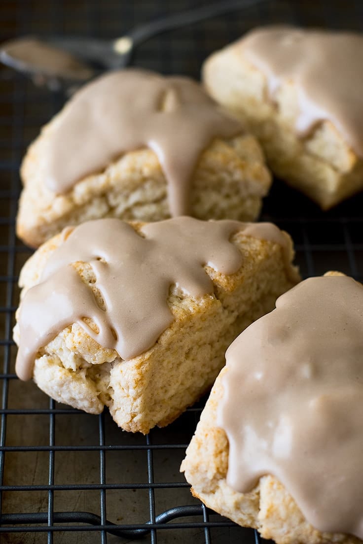 Small batch of maple scones on a wire rack.